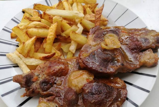 Ceafa de porc in sos de portocale la cuptor