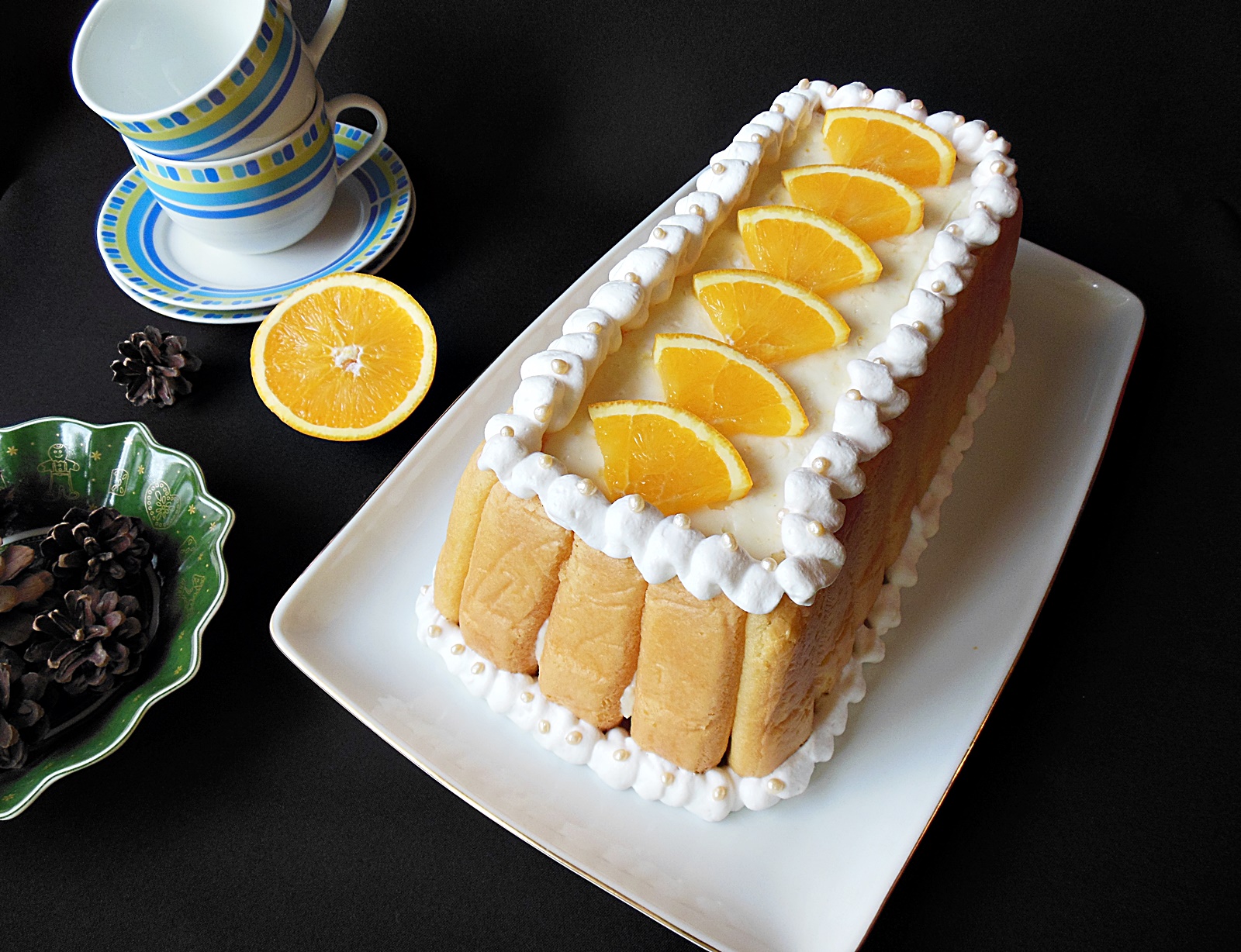 Desert tort cu piscoturi, crema de portocale si fructe tropicale